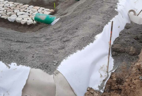 fabricación de cuentas de retención con geosintéticos NAUE